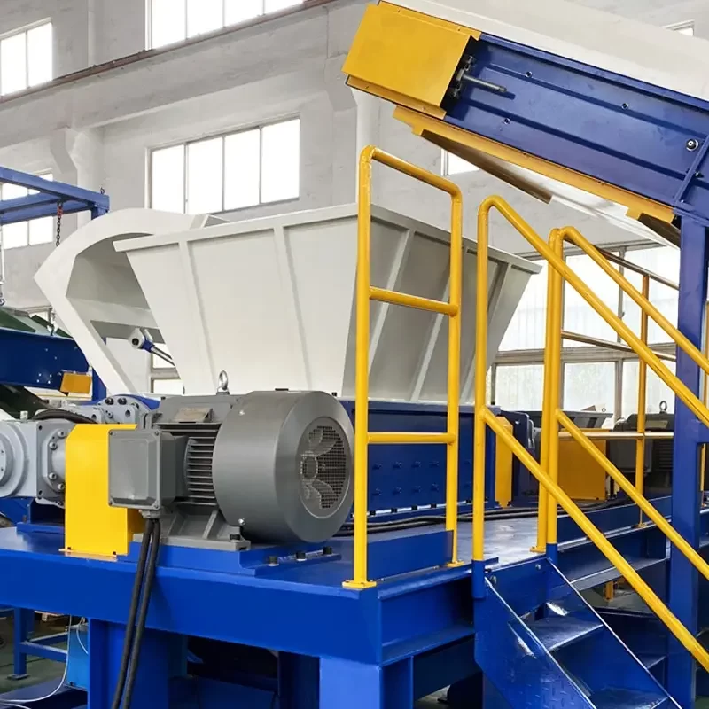 a double shaft shredder, a powerful industrial machine used primarily for the size reduction of a variety of materials, including plastics, metals, and paper. This type of shredder is characterized by its two rotating shafts, which are equipped with cutting blades that efficiently break down materials into smaller pieces.