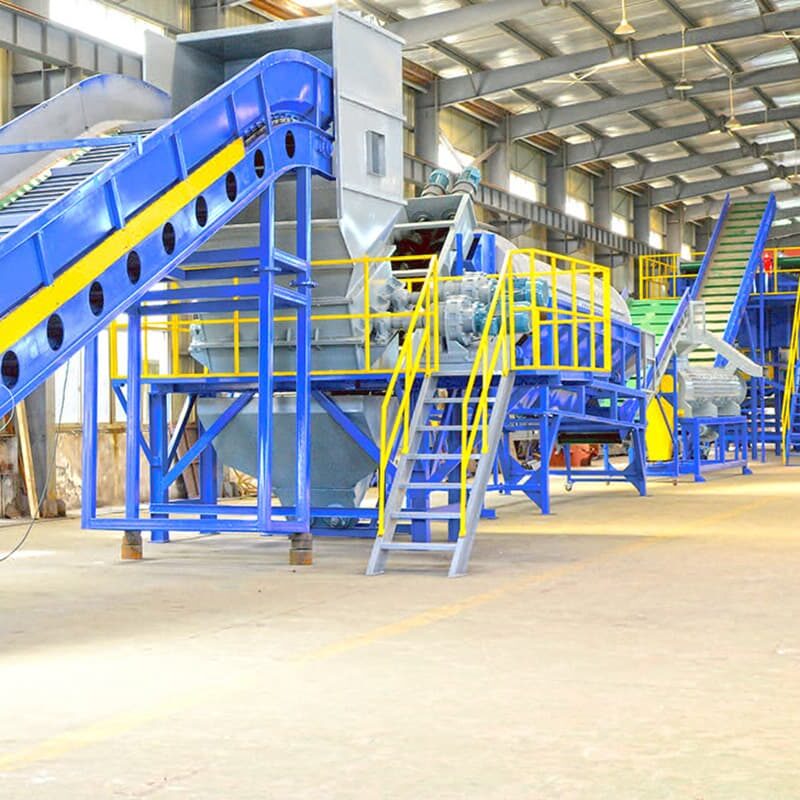 an expansive setup of a plastic bottle recycling machine within an industrial facility. This sophisticated system includes multiple stages of processing, which likely involve sorting, cleaning, shredding, and possibly pelletizing plastic materials. The visible equipment comprises a series of conveyors, shredders, and separation tanks, all coordinated in vibrant blue and yellow hues which are often used in industrial machinery for visibility and safety. This recycling line is designed to handle large volumes of plastic bottles, efficiently breaking them down into smaller components that can be further processed into recycled materials. These systems are essential for reducing plastic waste and supporting sustainable recycling efforts, converting post-consumer plastic bottles into reusable raw materials. The setup suggests a high-capacity operation, aimed at minimizing waste and maximizing recycling efficiency in a large-scale industrial context.