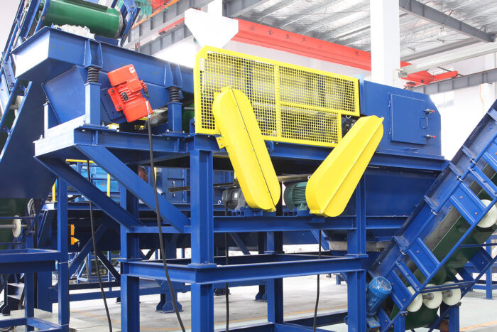 an Eddy Current Separator, a specialized recycling machine used for separating non-ferrous metals from other materials in a mixed waste stream. This type of equipment is critical in the recycling industry for sorting aluminum, copper, brass, and other valuable metals from bulk material.